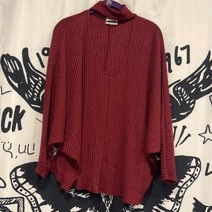 small maroon sweater